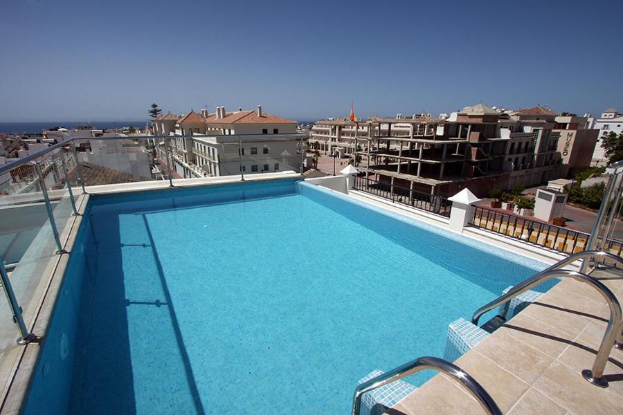 La Botica, beautiful apartments with swimming pool in Plaza España, Nerja.