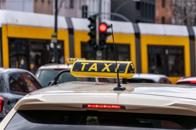 What is the cost of a taxi from Malaga airport to Nerja?